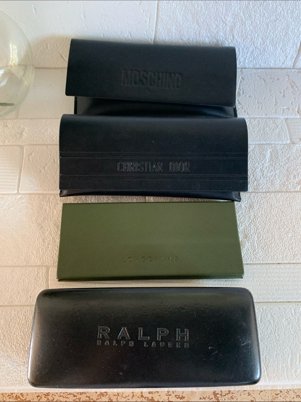 Lot of designer sunglass cases